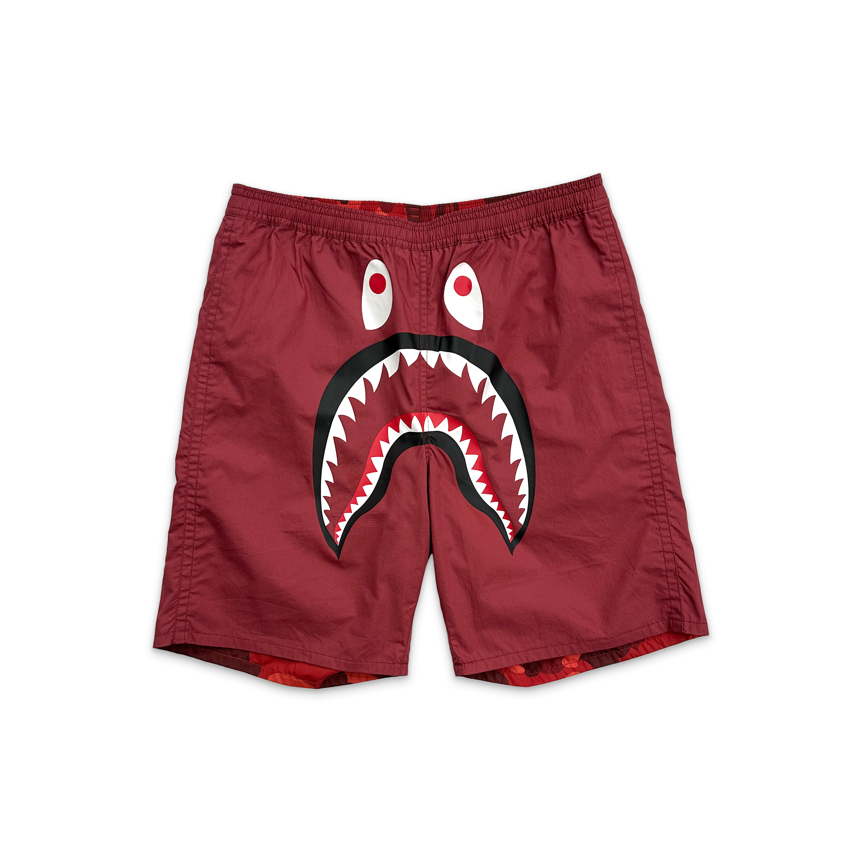 A Bathing Ape (BAPE), Reversible Color Camo Shark Head Shorts “Red”