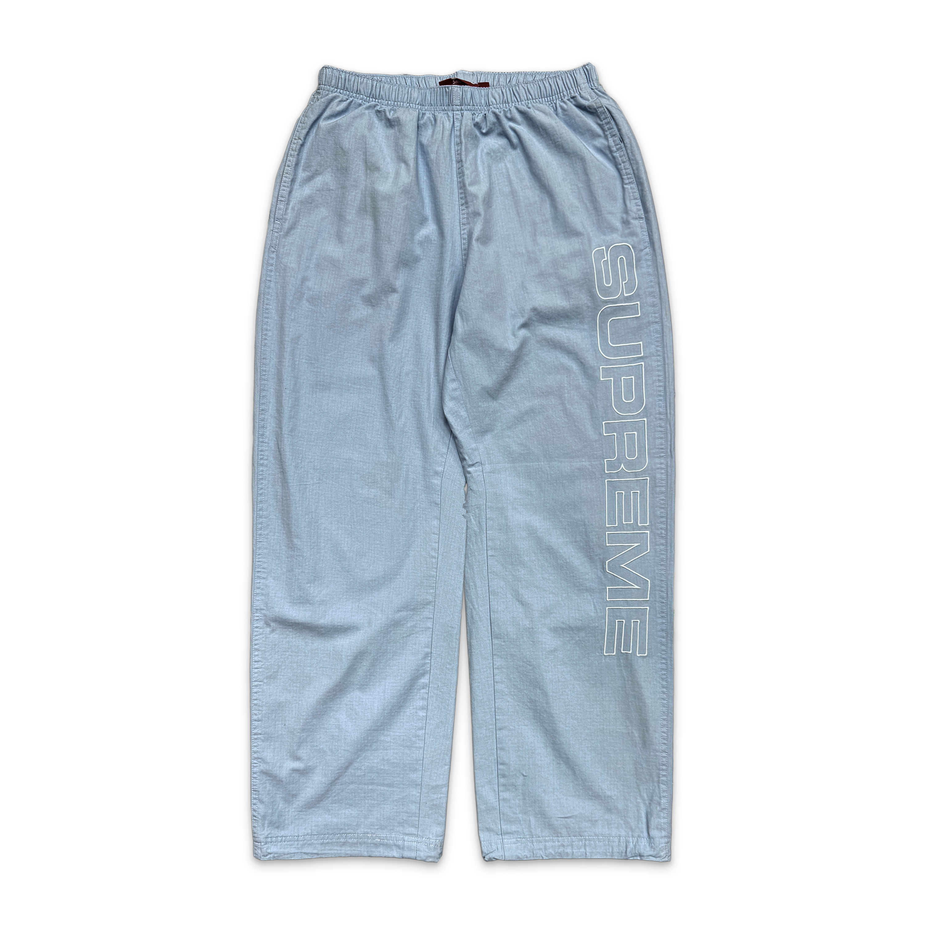 Supreme, Spellout Ripstop Track Pants FW25 "Light Blue"