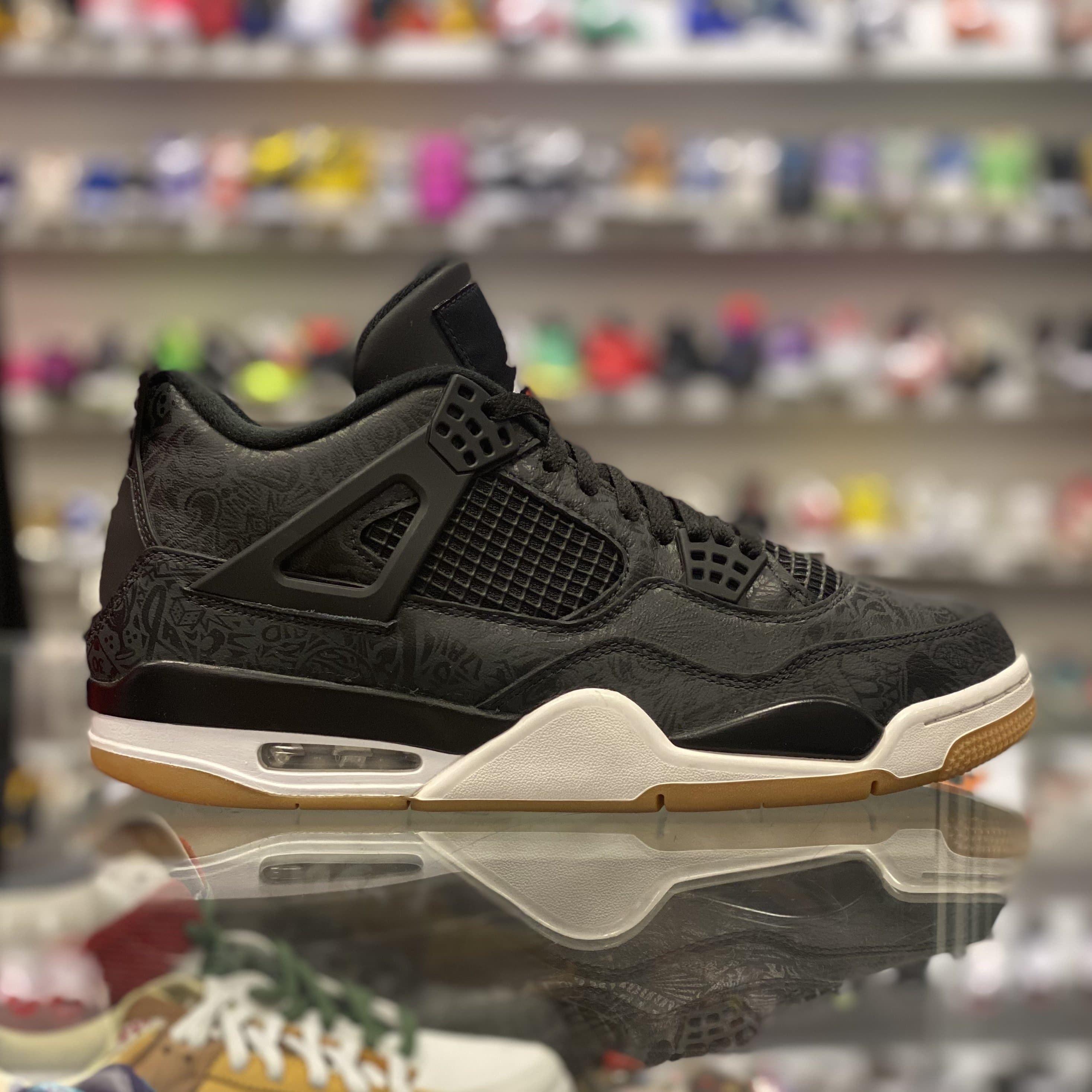 Air Jordan 4 Retro “Laser Black Gum”
