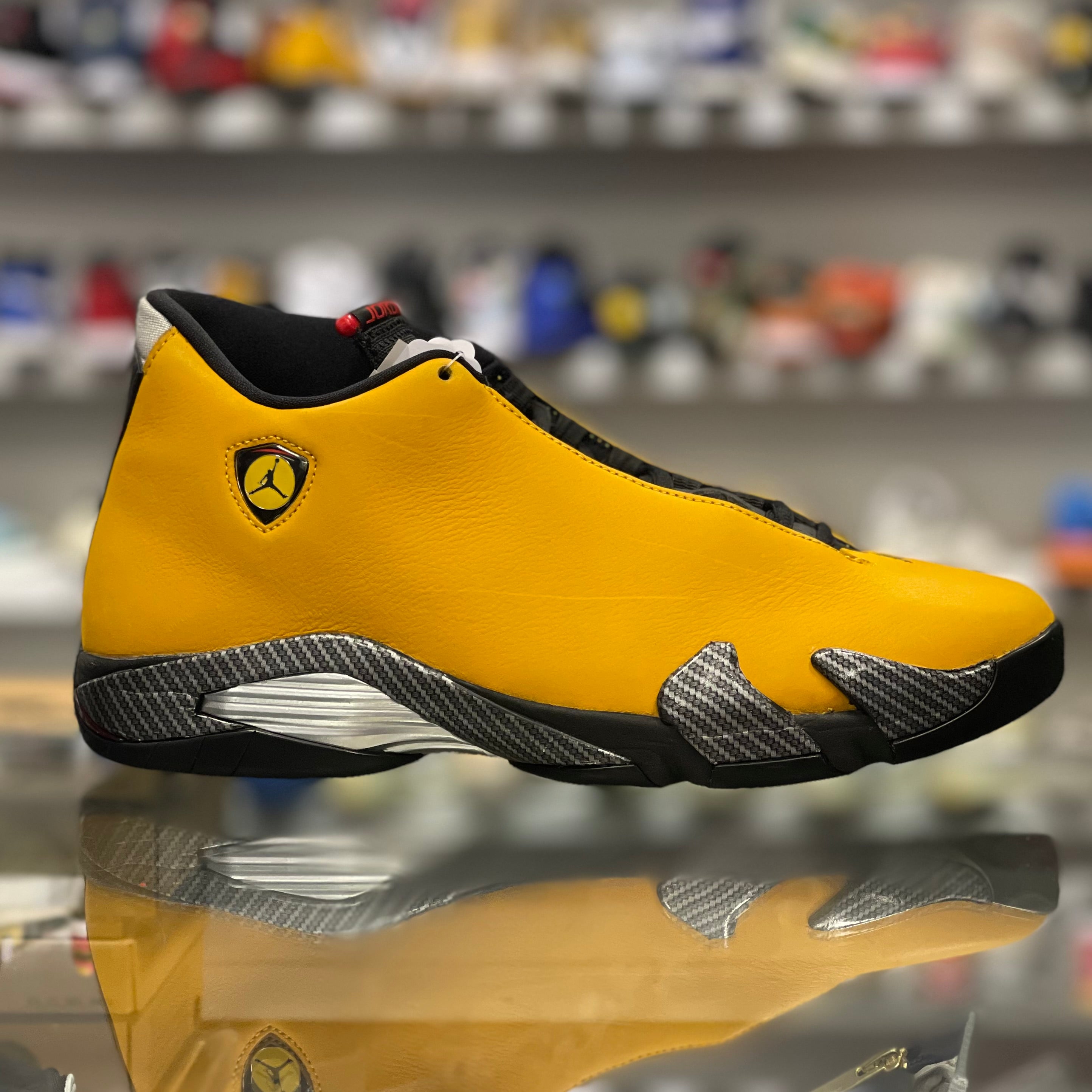 Air Jordan 14 Retro “University Gold”