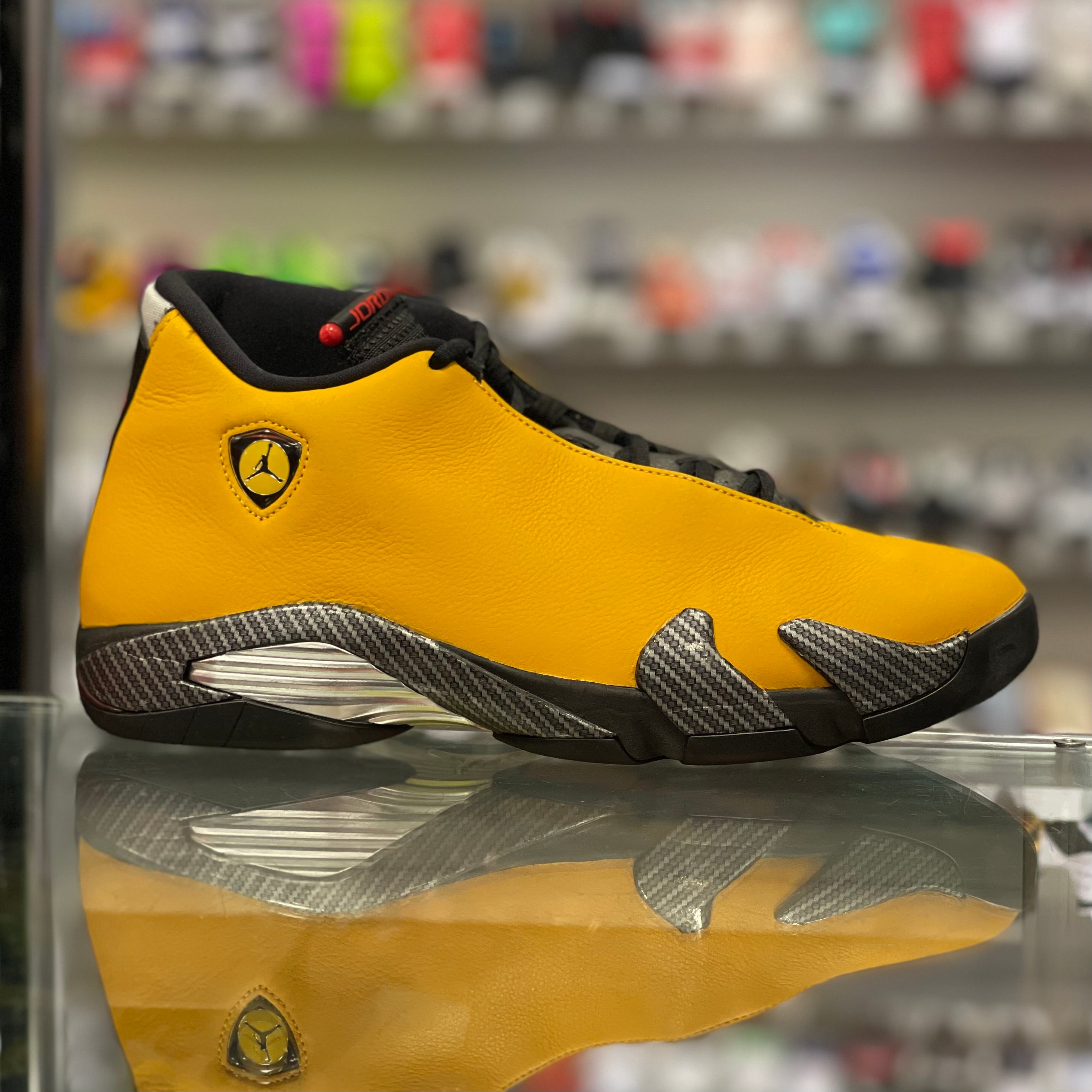 Air Jordan 14 Retro “University Gold”