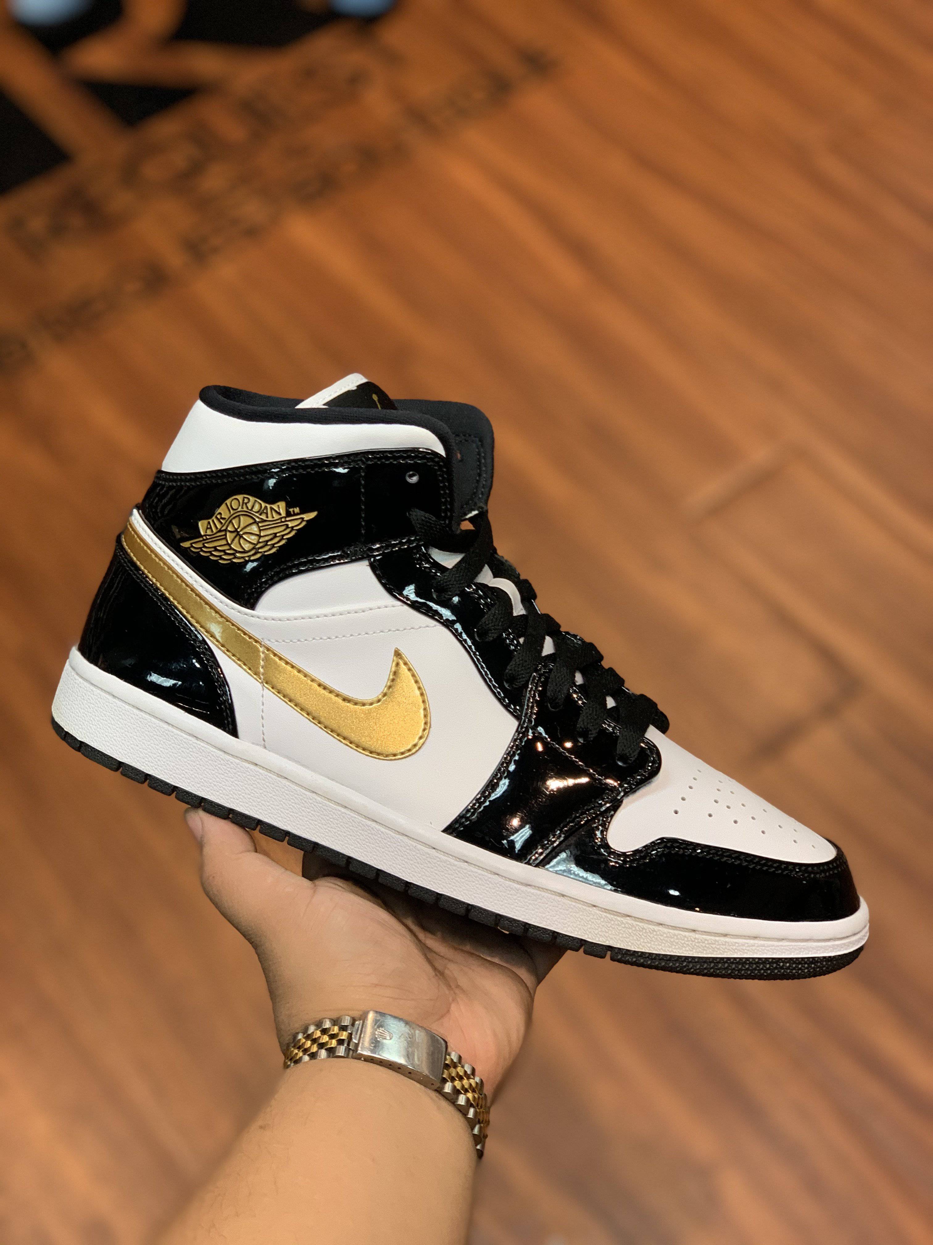 Jordan 1 Mid “Patent Black White Gold”