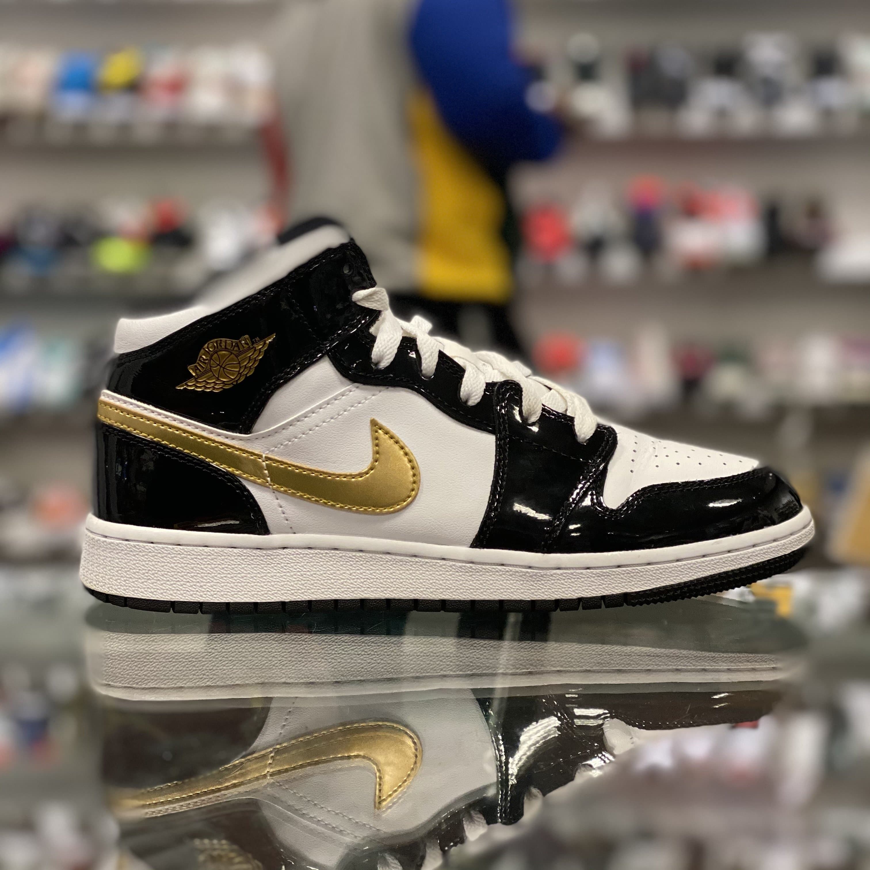 Jordan 1 Mid “Patent Black White Gold”