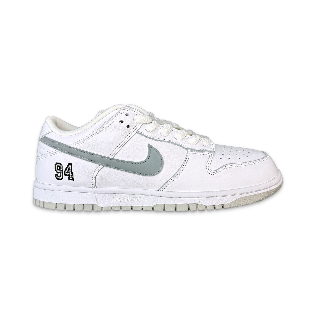 Supreme × Nike SB Dunk Low \"White/ll Supreme Nike SB Dunk Low White (FW25) - $130