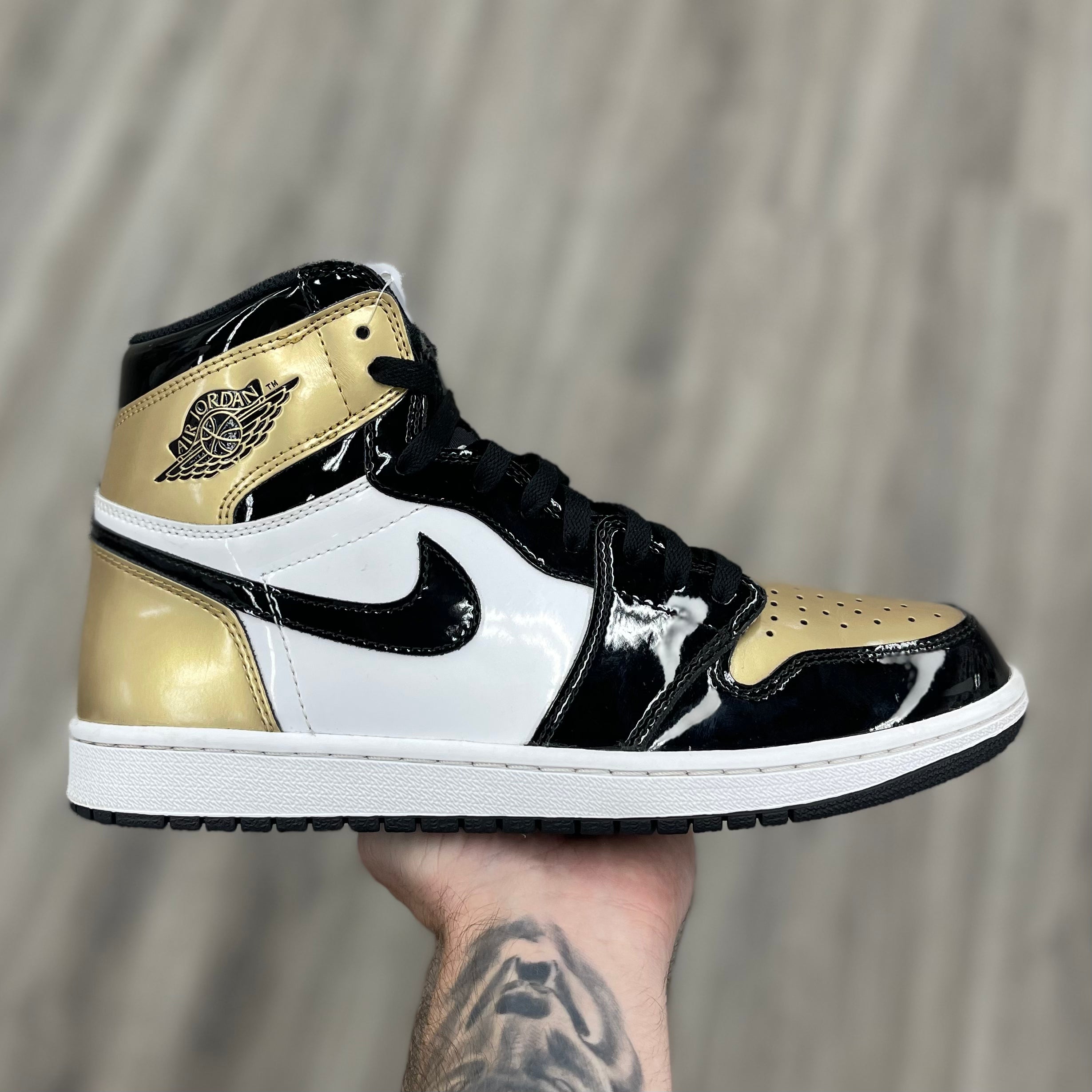 Air Jordan 1 Retro NRG “Gold Toe”