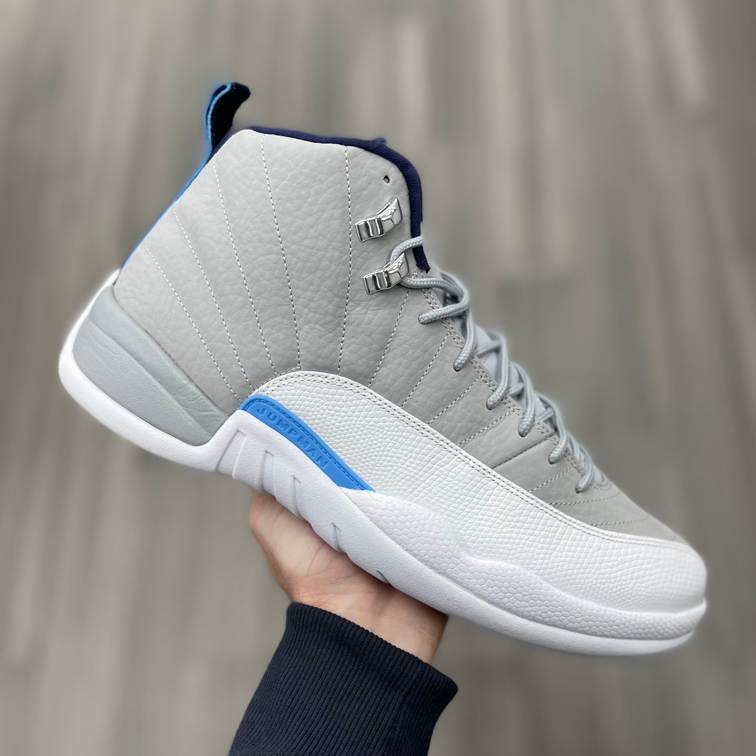 Jordan 12 on sale grey university blue